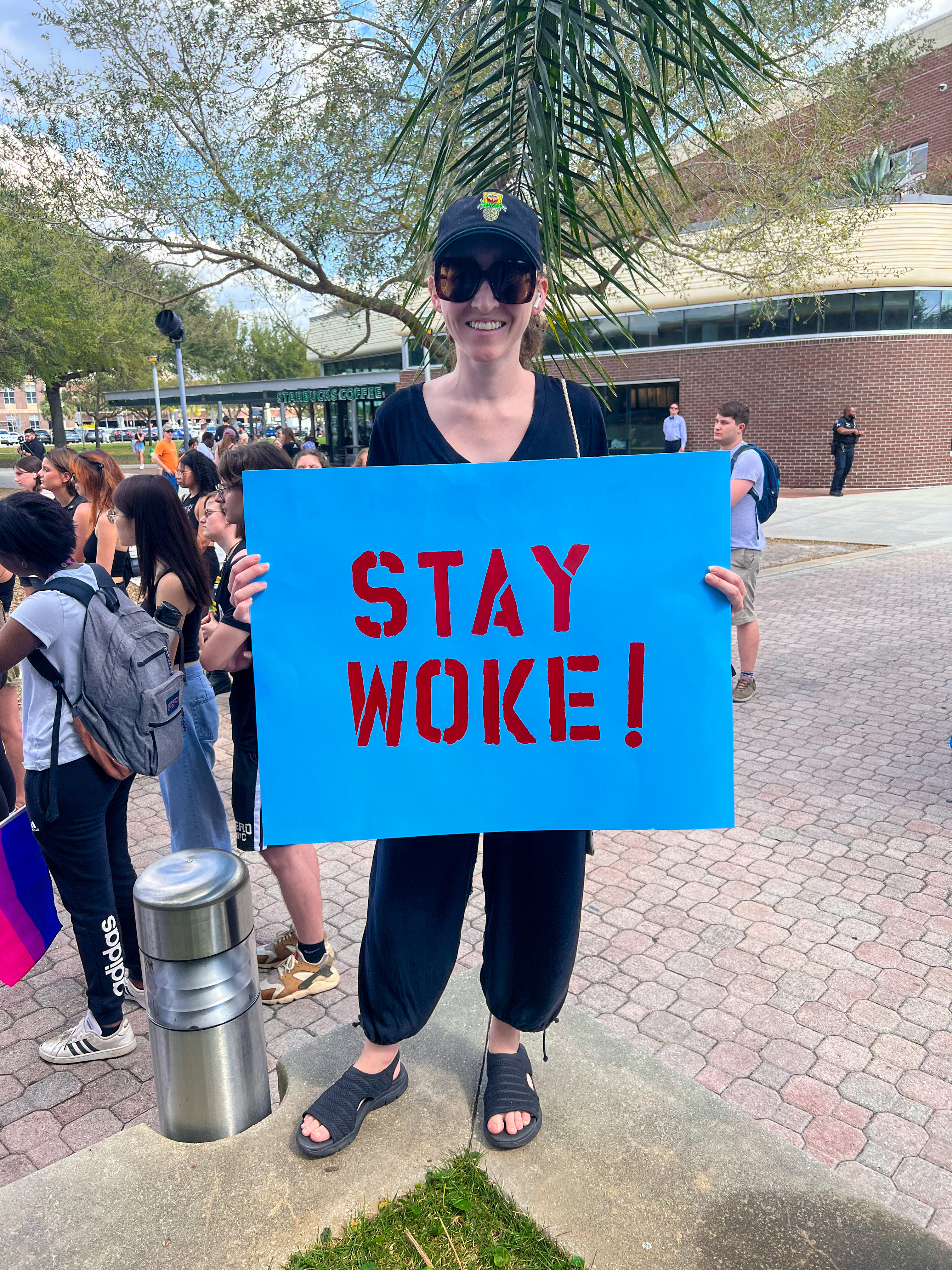 woman protester holding sign