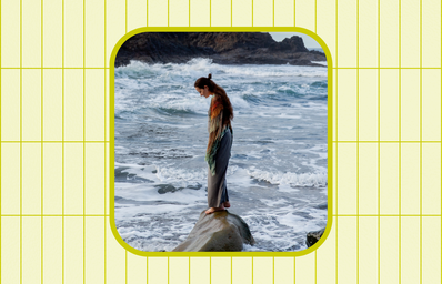 woman standing in ocean