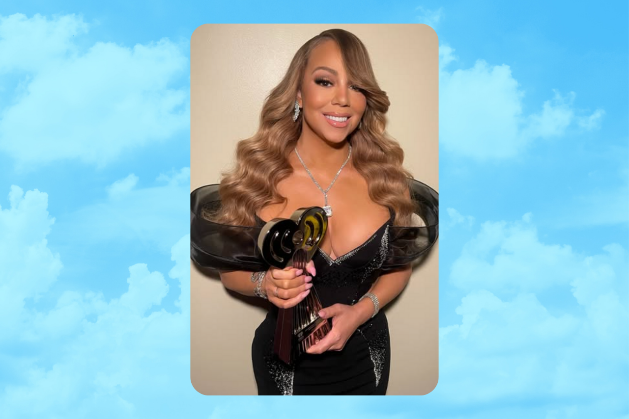 Mariah Carey holding her 2025 iHeart Radio Music Awards trophy