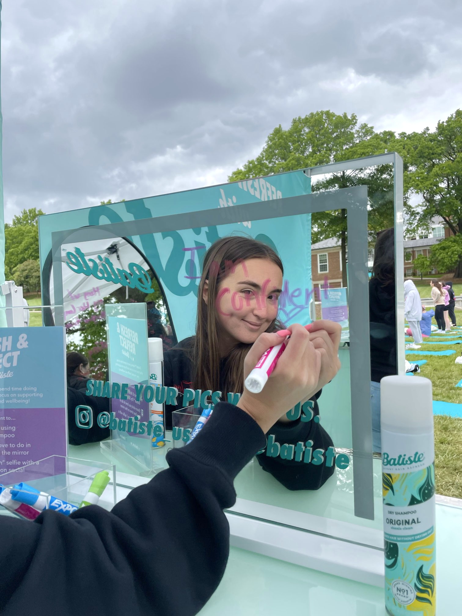 Girl writing on mirror