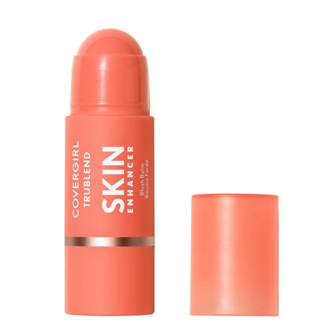 Coral-colored makeup stick with the lid removed, labeled \