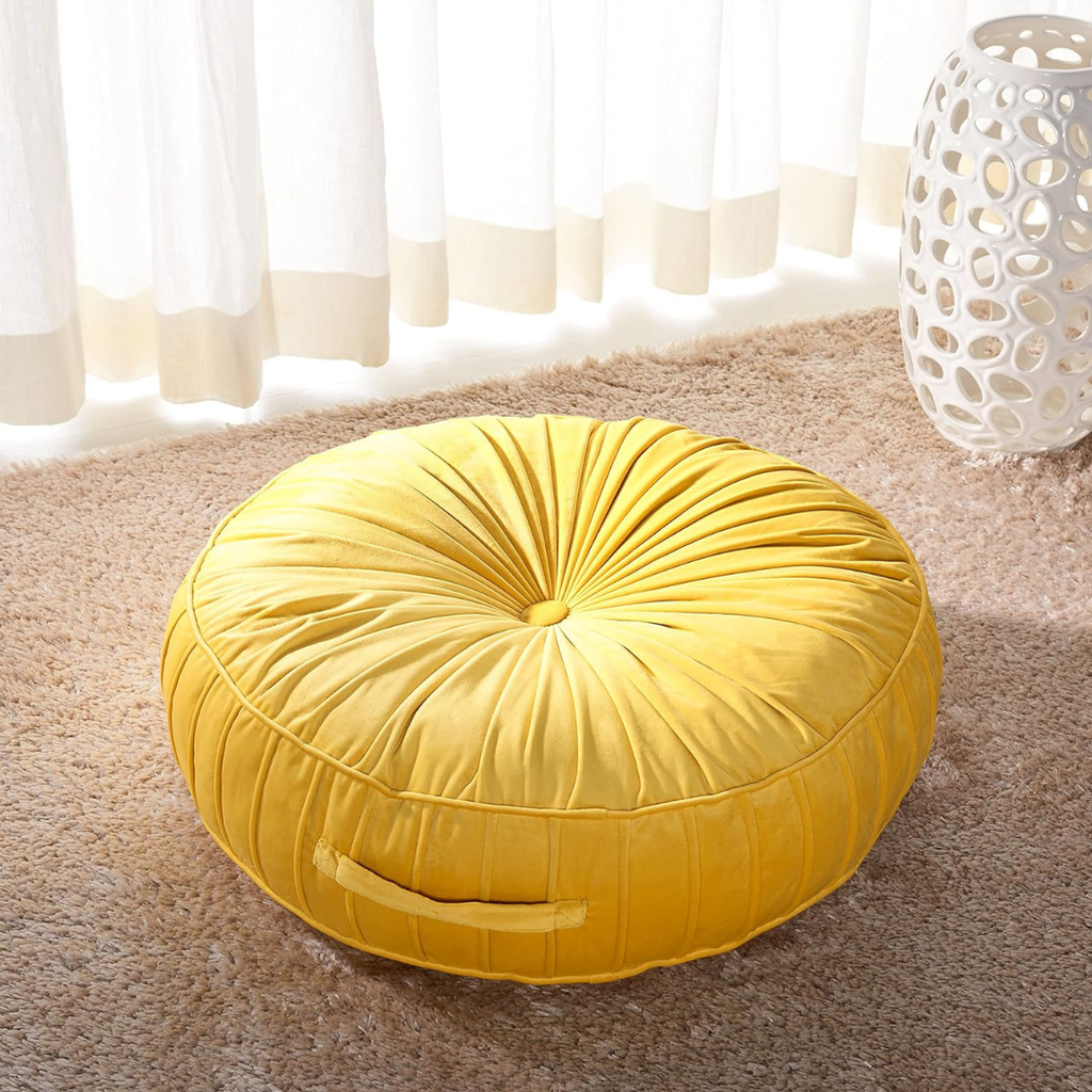 yellow round floor pillow with handle