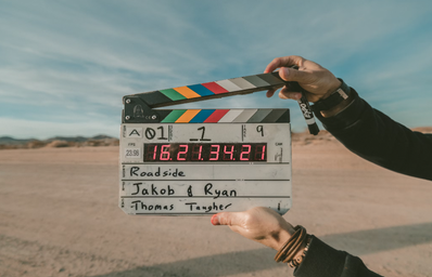 clapperboard in desert like landscape