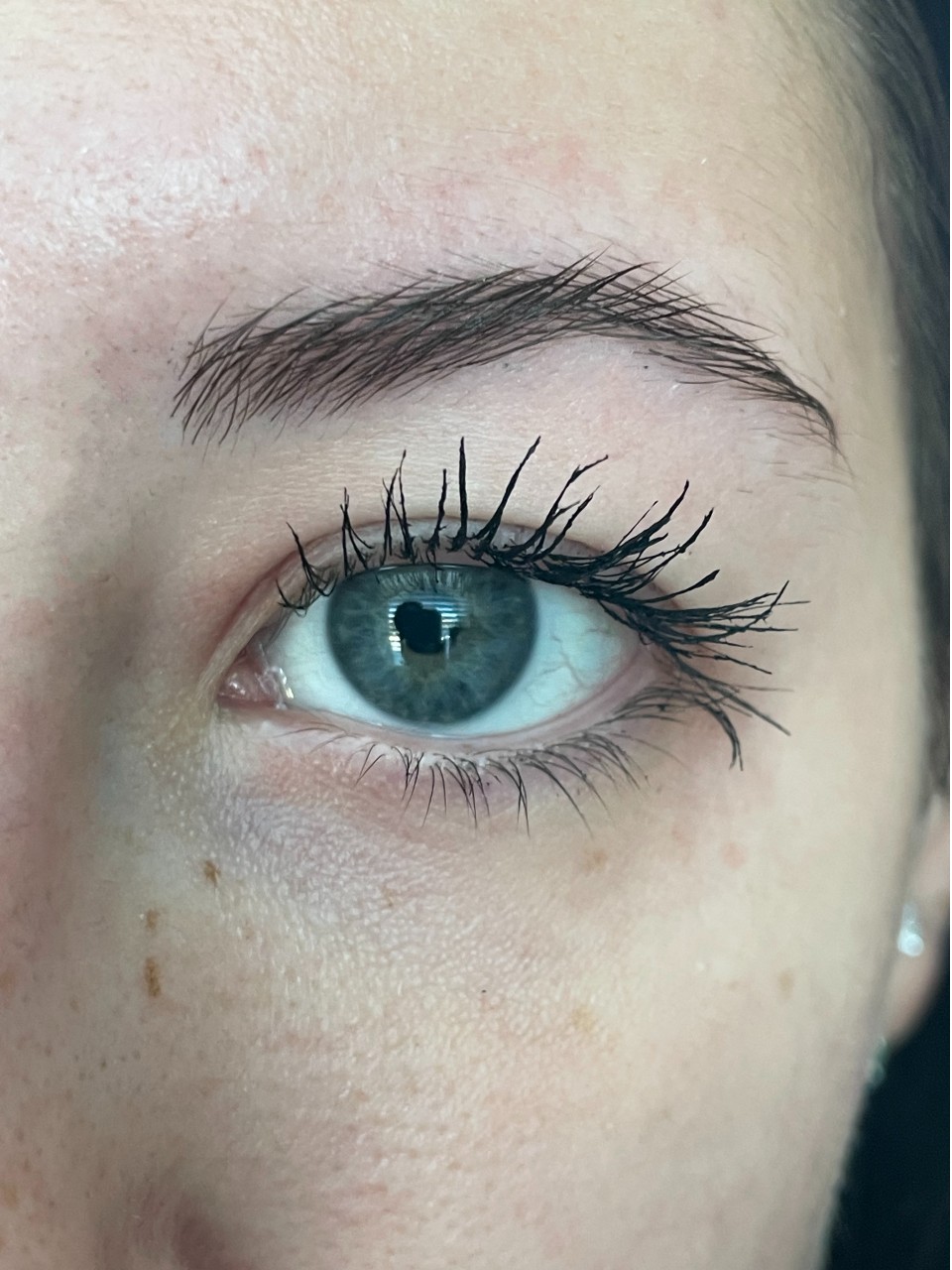 Close up of eyeball showing mascara