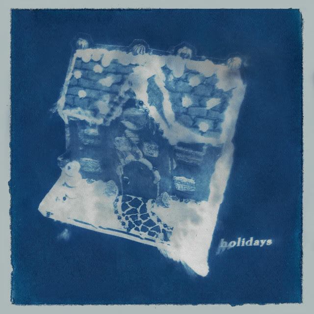 blue gingerbread house album cover