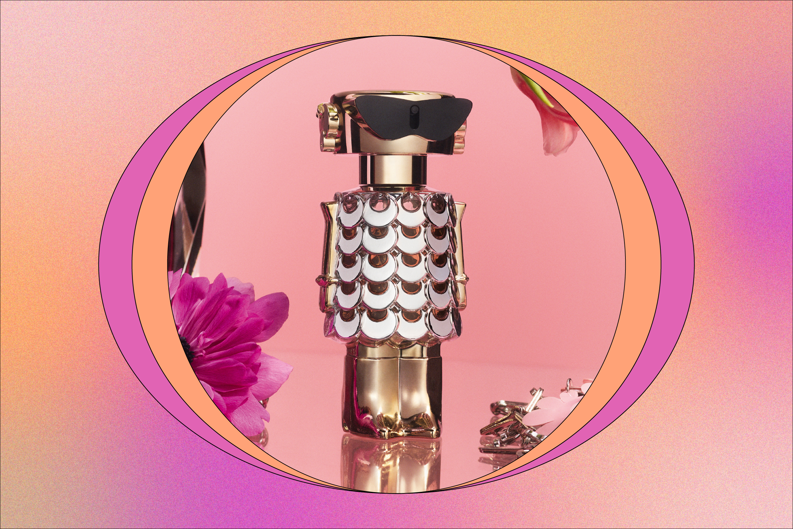 Gold perfume bottle and flowers on pink background.