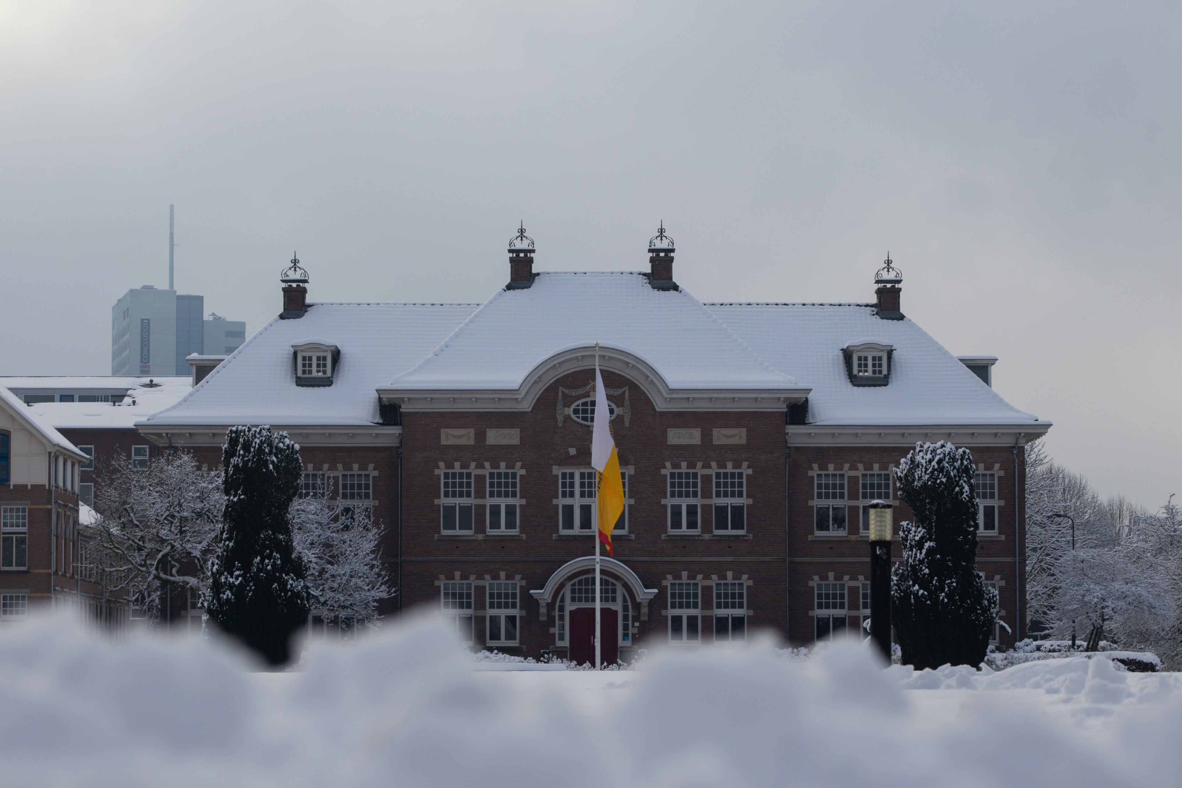 brick building with snow