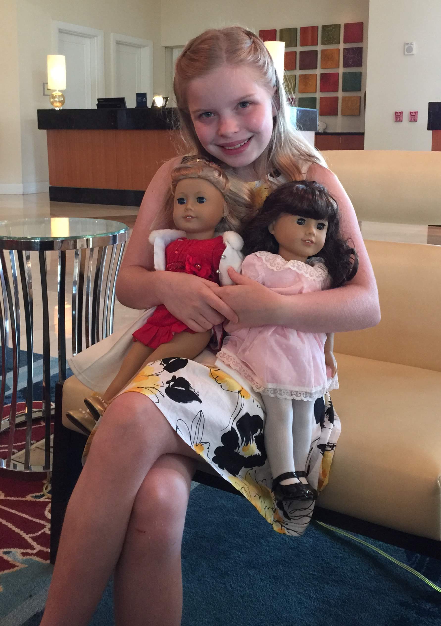 Ten year old me with my American Girl dolls, looking very eager for our next stop, the American Girl store in Orlando!
