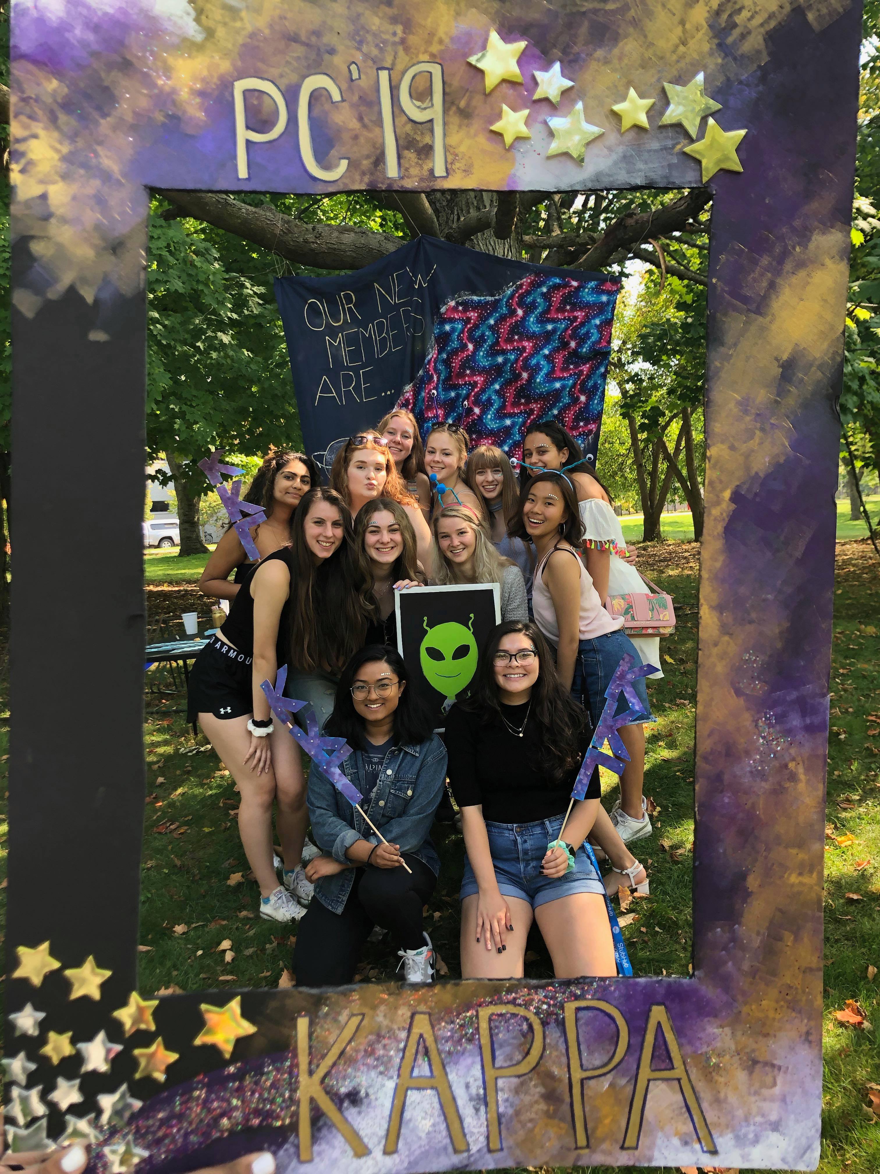 alien themed bid day group photo