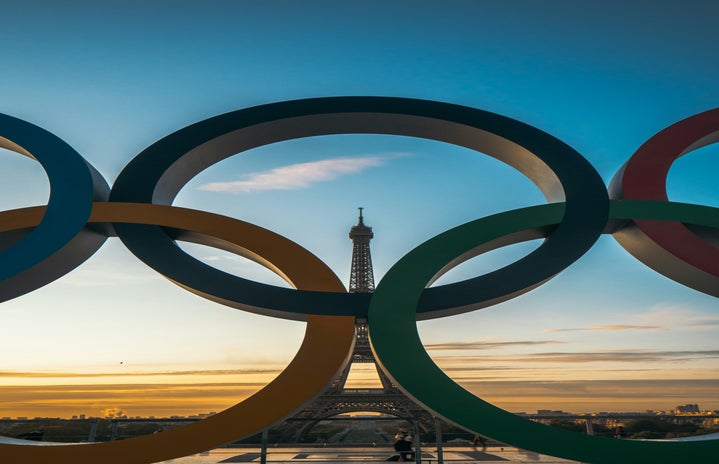 Olympic rings in front of the Eiffel Tower.