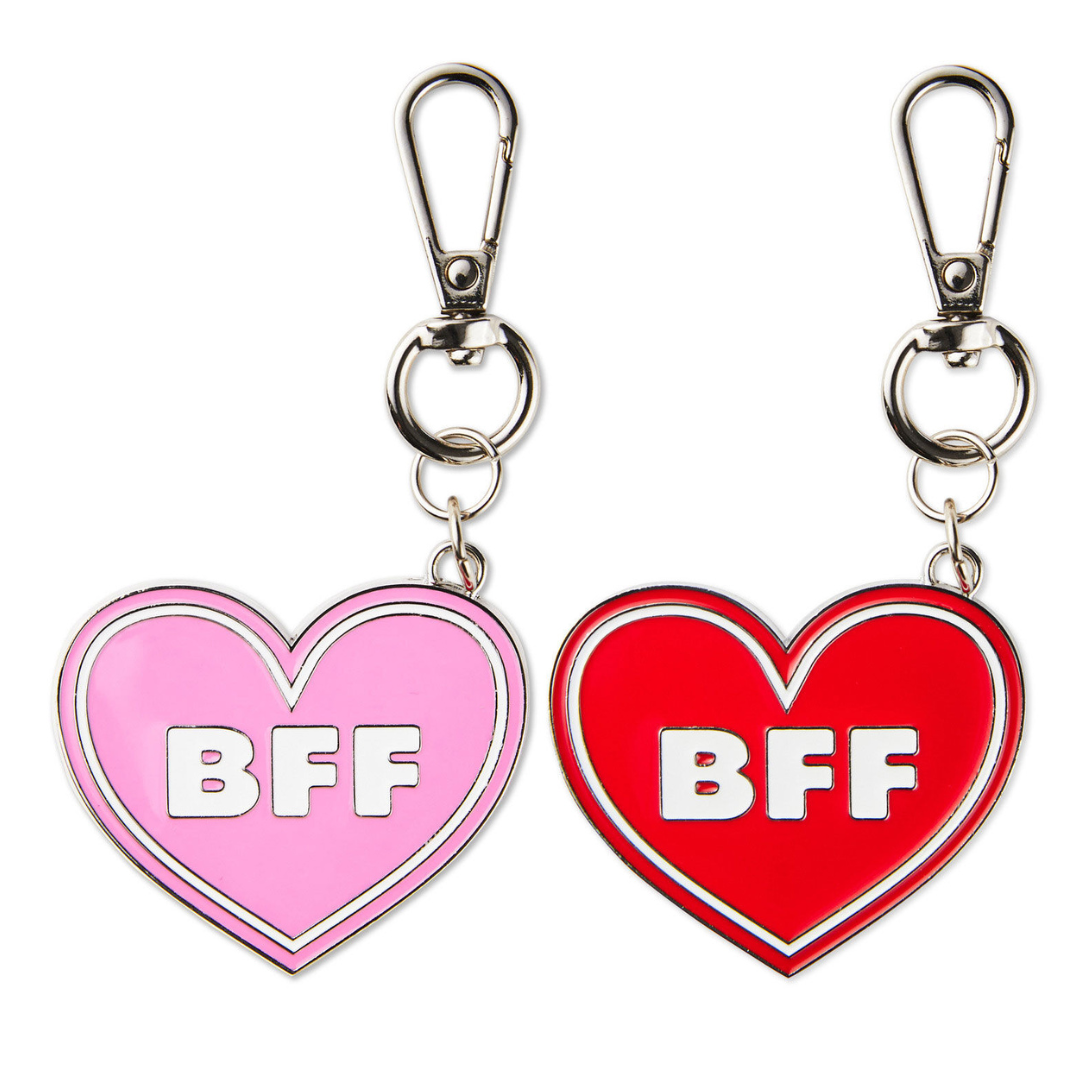 red and pink heart-shaped backpack clips that say \