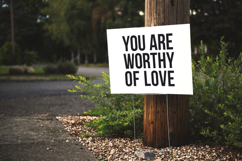 worthy of love signjpg by Unsplash