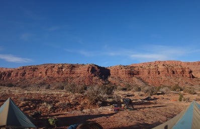 Mesas of Utah with tents and backpacks