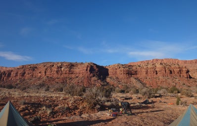 Mesas of Utah with tents and backpacks