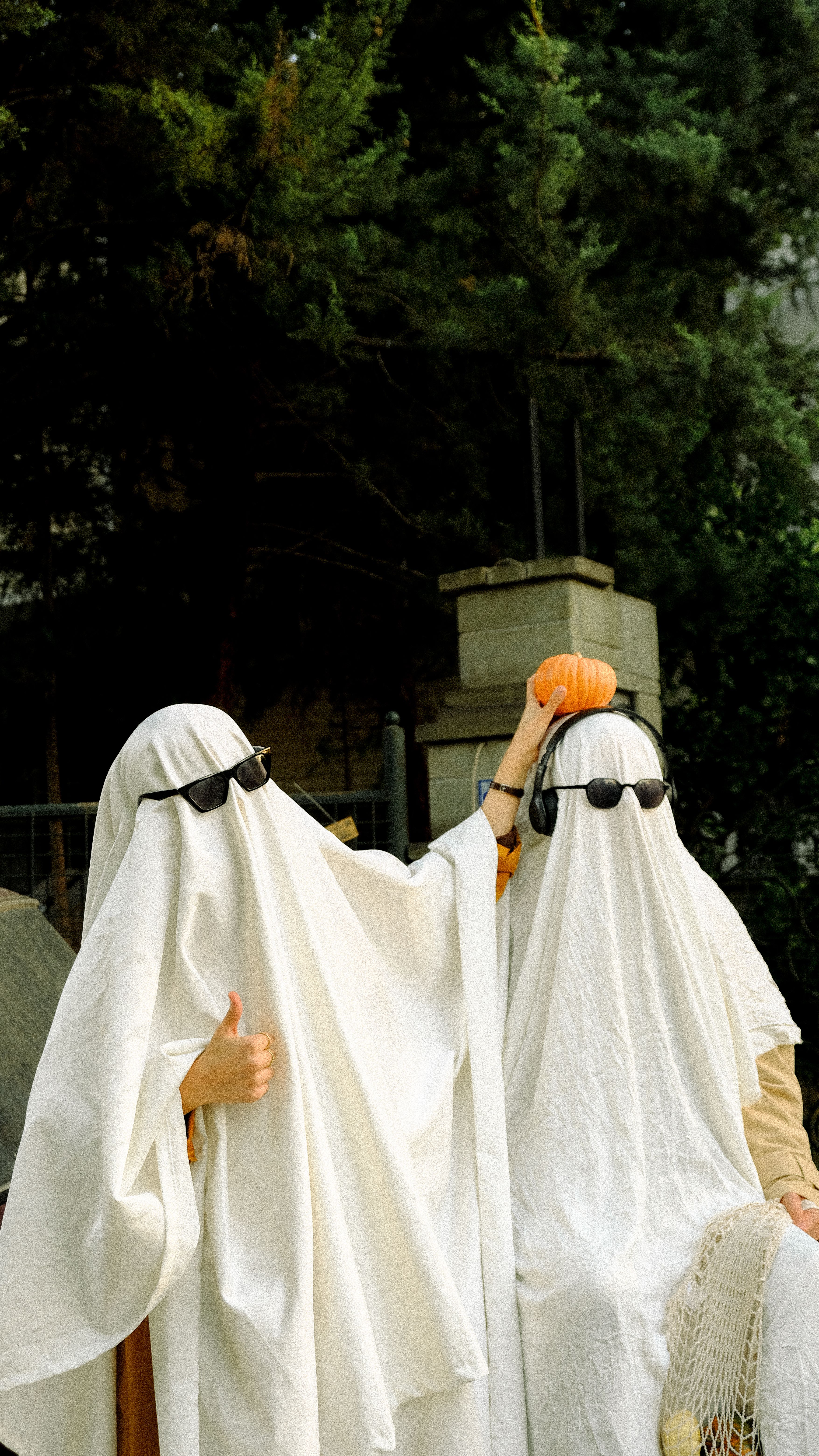 people in ghost costumes