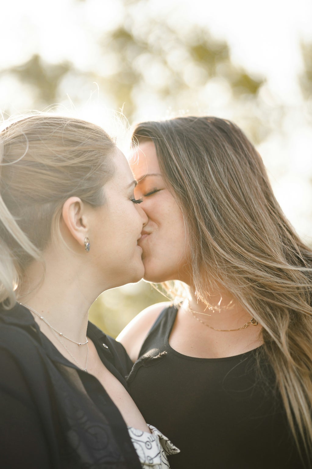 Female couple kissing