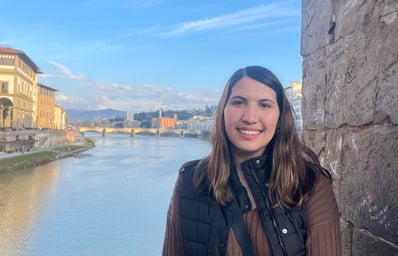 Karly Buckenmaier in front of river in Italy