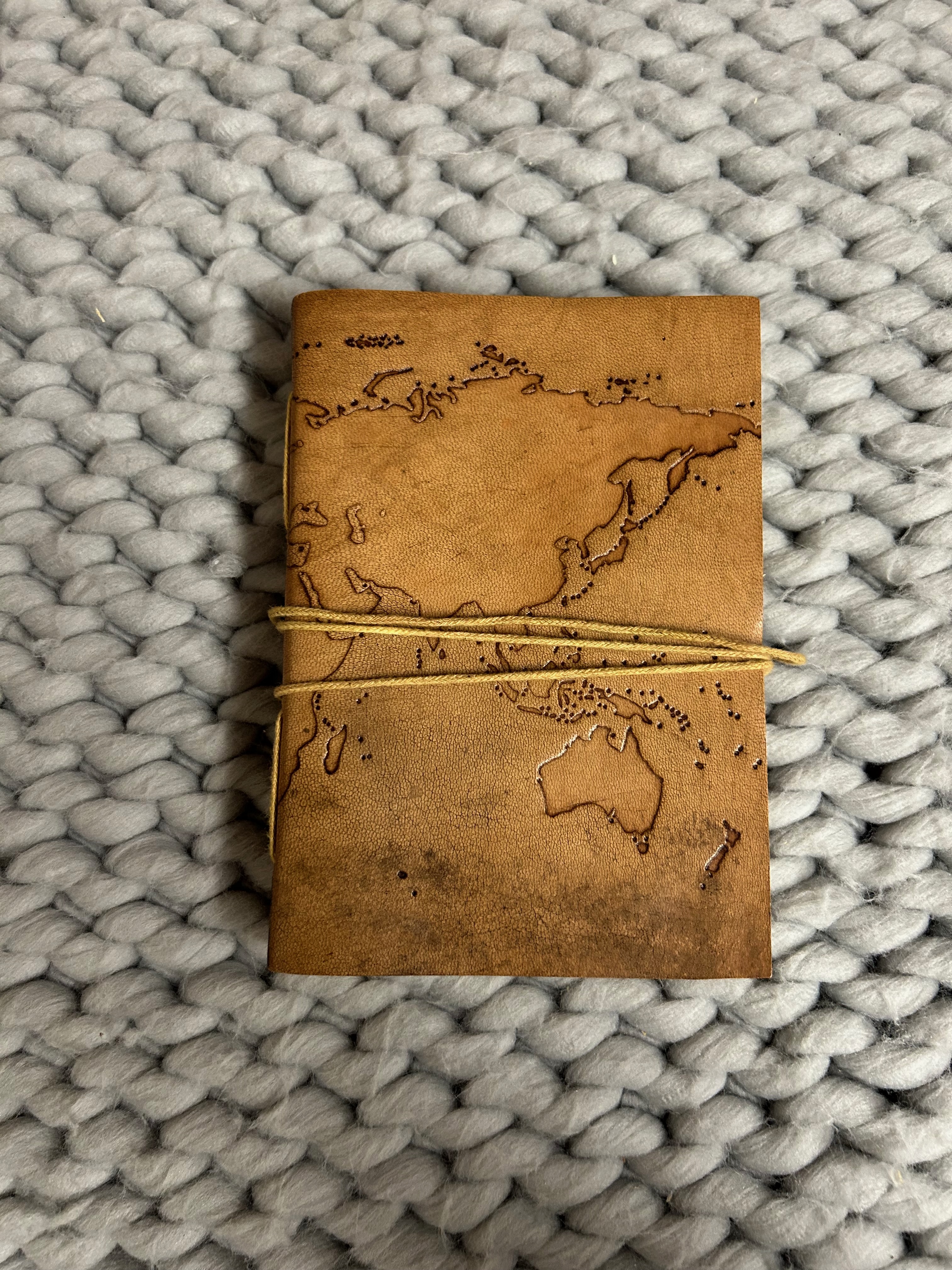 journal sitting on bed