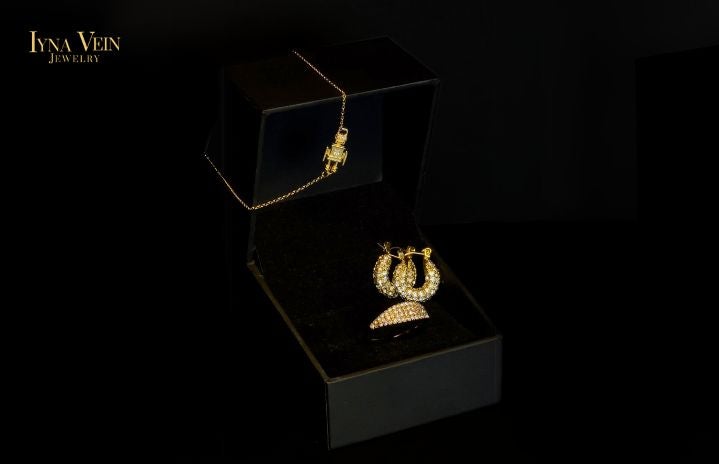 Hoop earrings and a bracelet by Iyna Vein