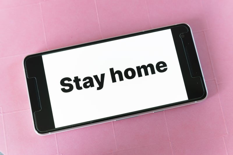 a phone that says stay home