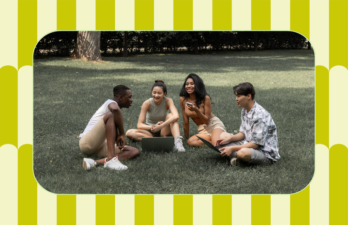 A group of friends sitting in a park.