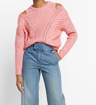 pink sweater with cut out shoulder