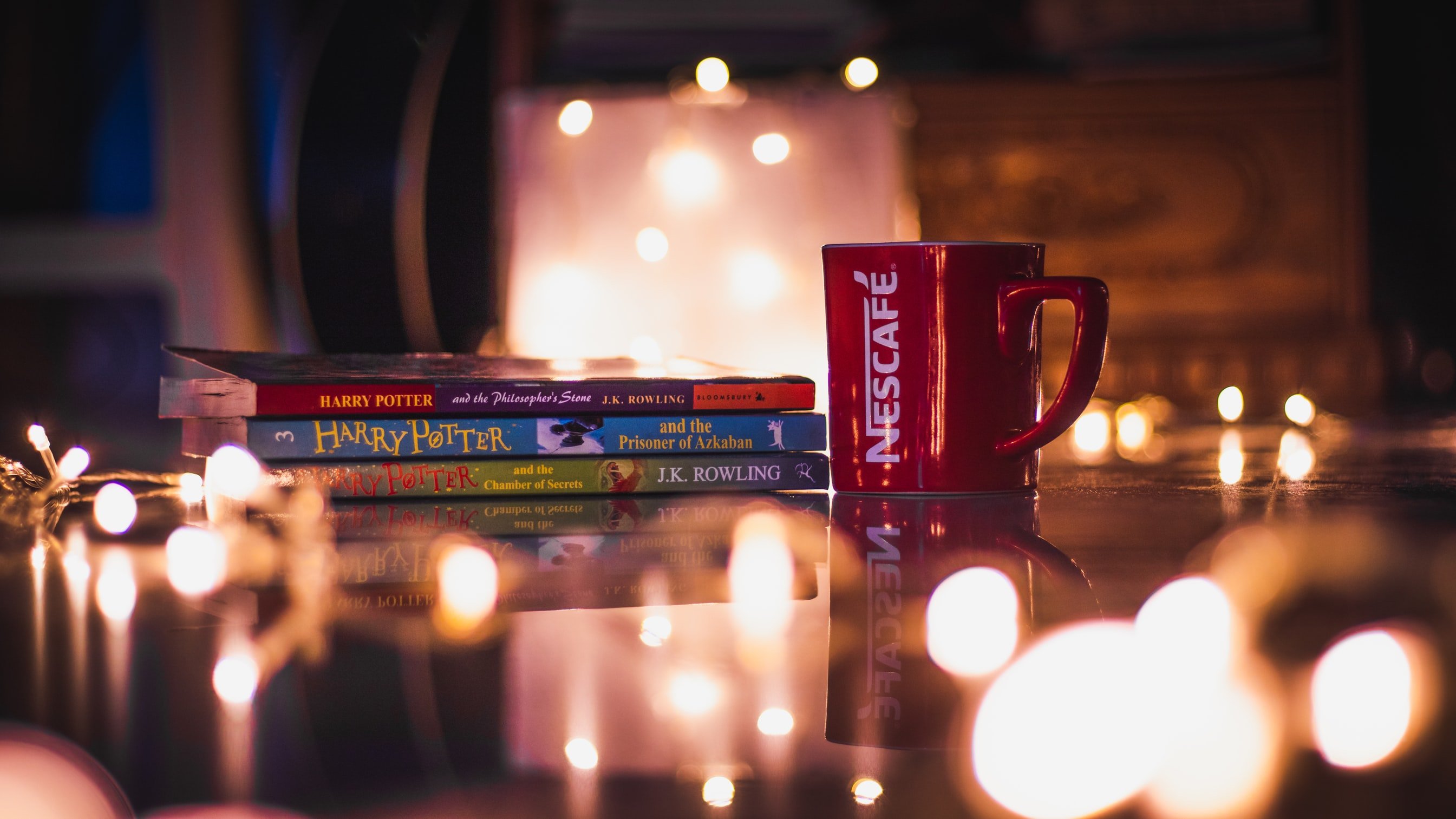 book and candles by Unsplash?width=698&height=466&fit=crop&auto=webp&dpr=4