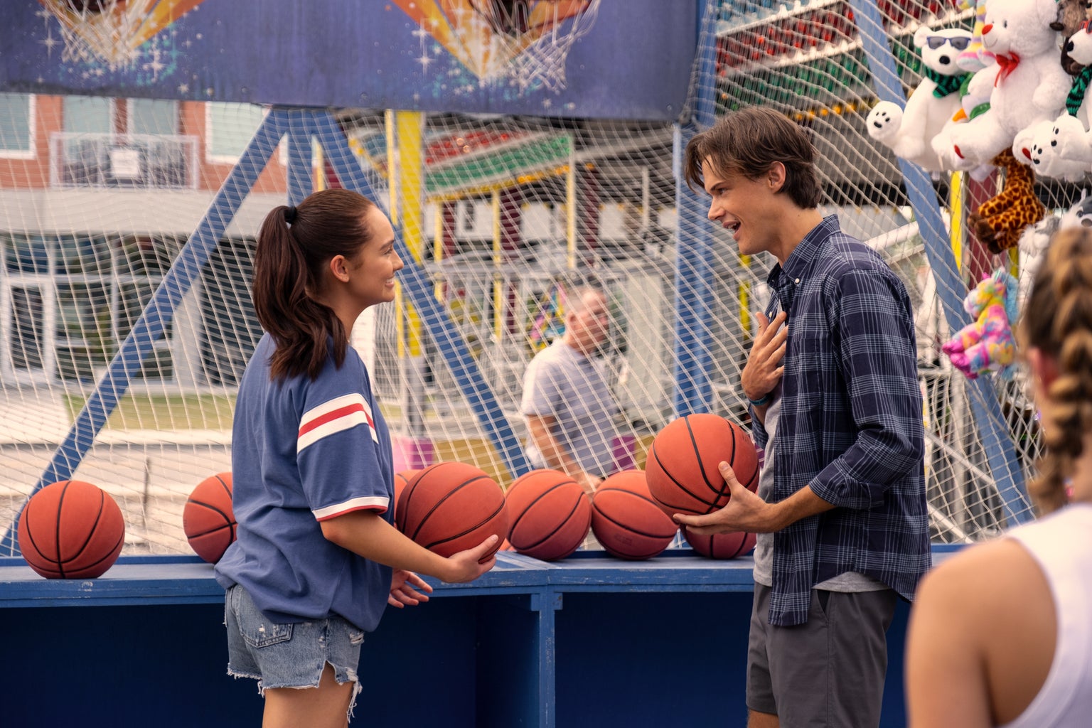 belly and conrad playing basketball on the boardwalk in the summer i turned pretty season 2