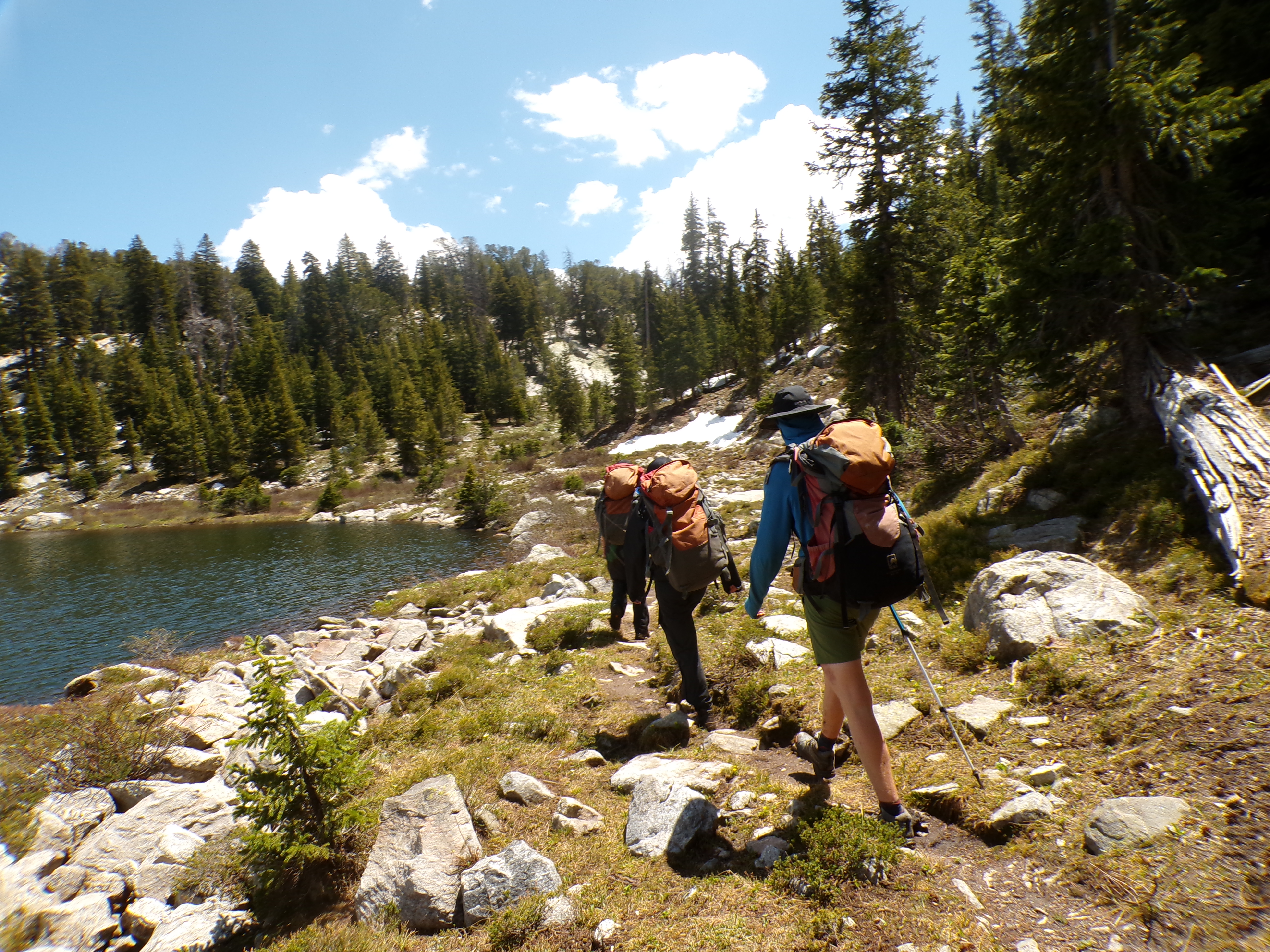 Backpackers walking on trail in Wyoming\'s Wind River Range.