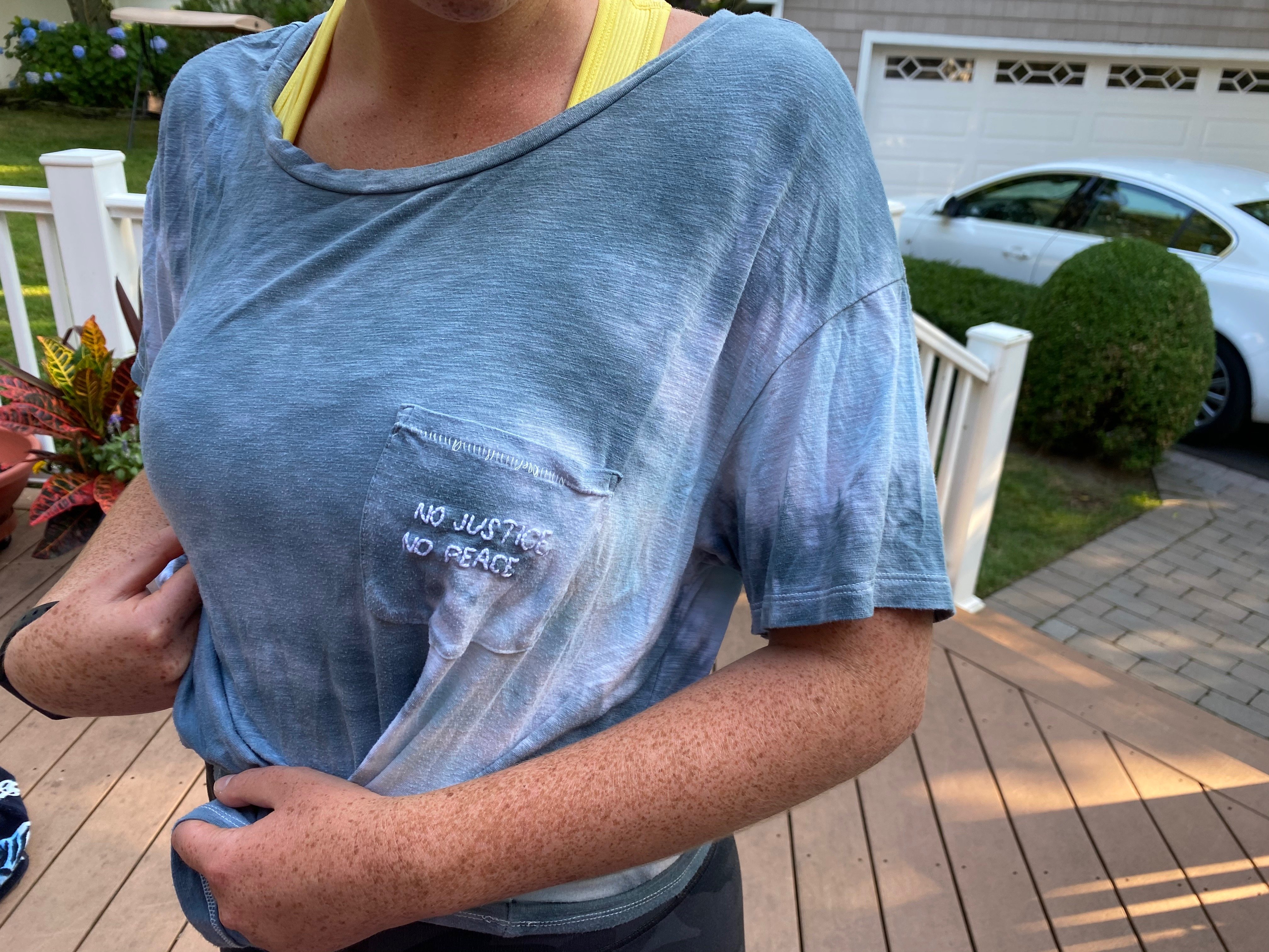 Girls who are featured in article wearing \"stitch-it to the patriarchy\" apparel