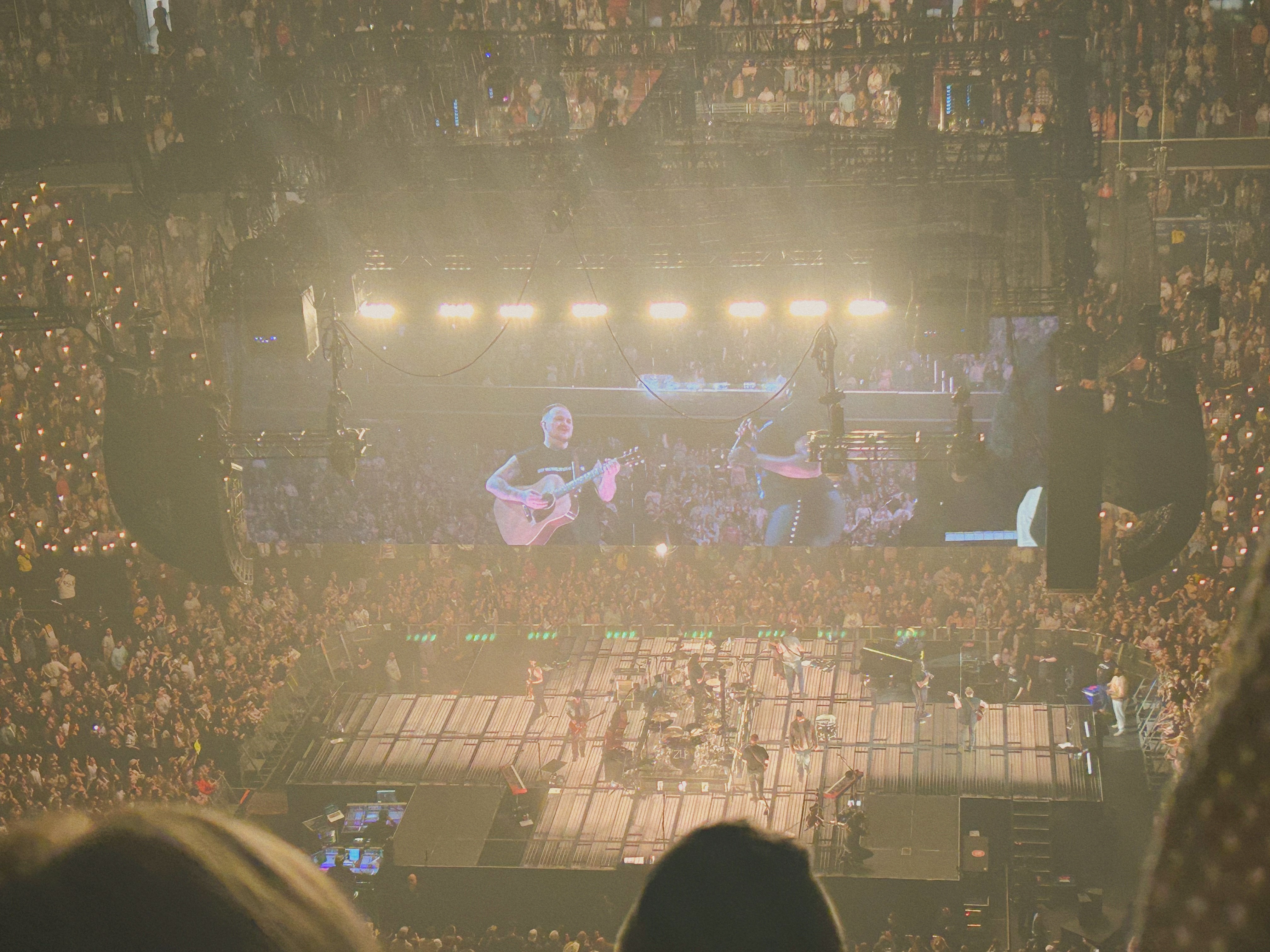 zach bryan preforming at the capital one arena