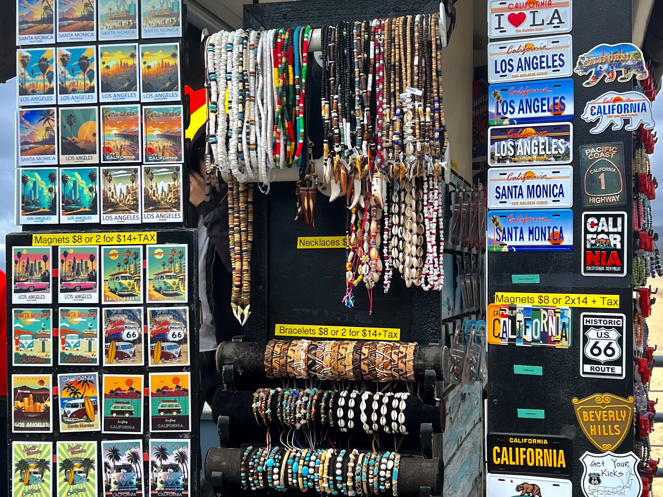 Los Angeles Souvenirs (necklaces, postcards) at a shop on the road.