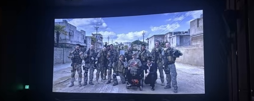 Photo taken of an image shown in the credit scene of Warfare