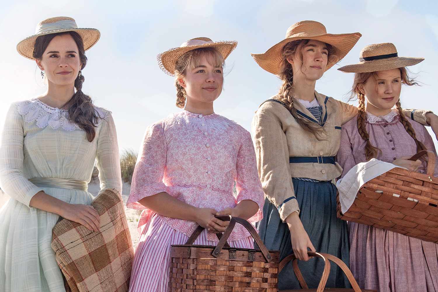 A still from Greta Gerwig\'s Little Women featuring the four sisters: Meg, Jo, Beth, and Amy.
