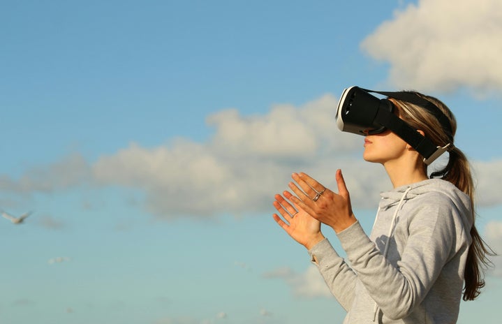 woman using a virtual reality glasses.