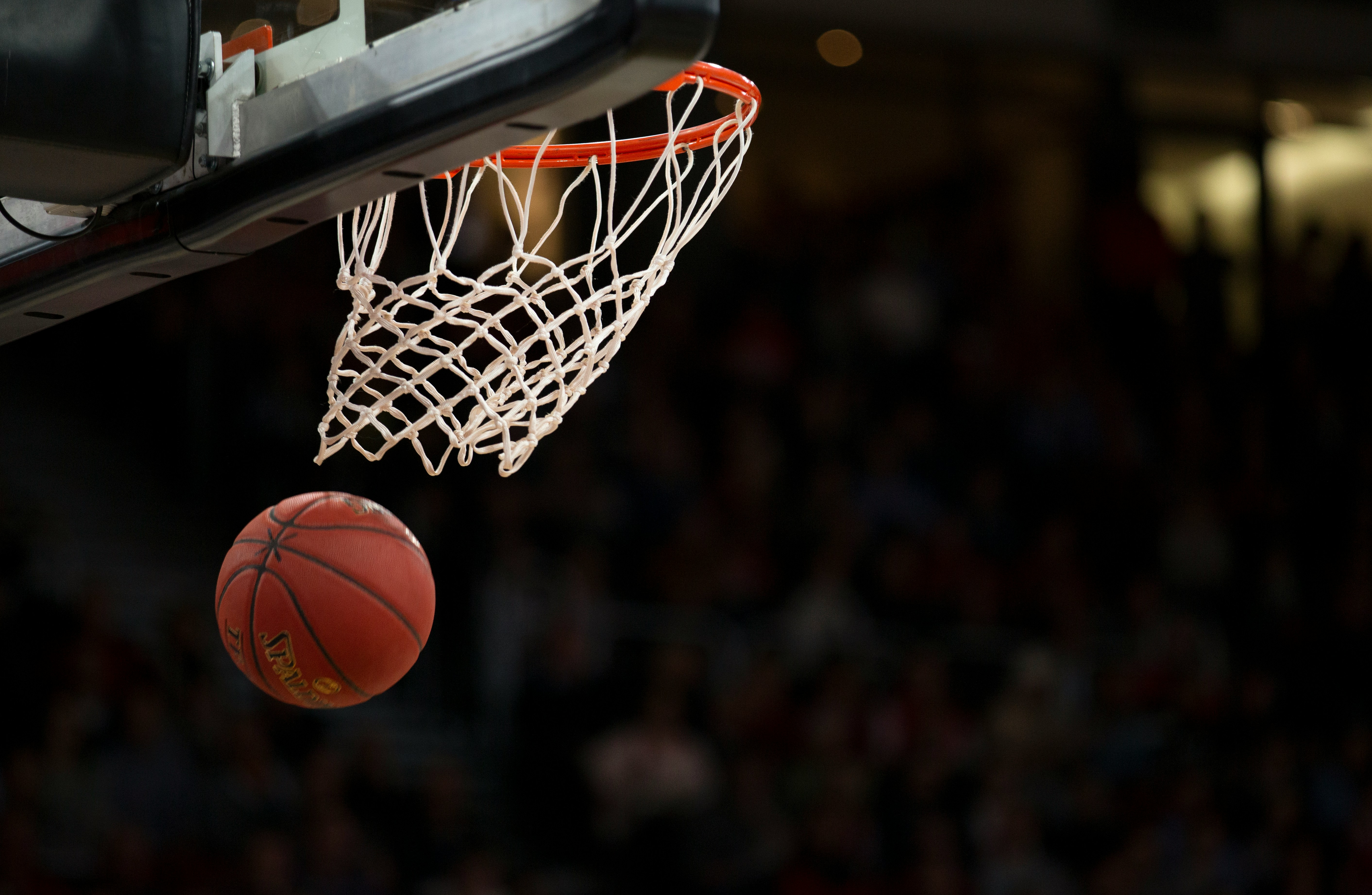 Basketball through hoop