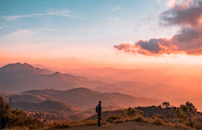 Man looking at mountain