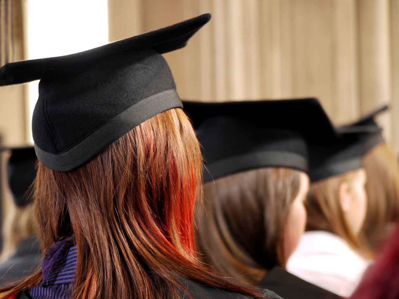 woman wearing graduation cap