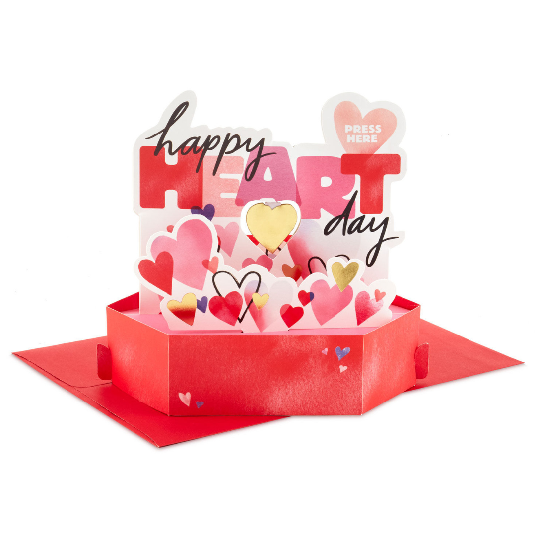 pop-up Valentine\'s Day card with multi-colored hearts and red base