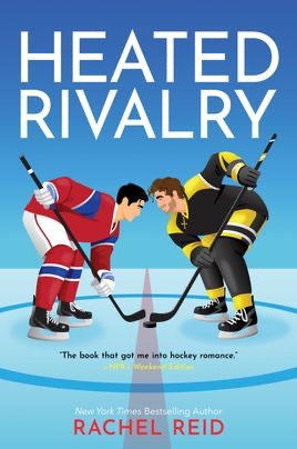 Two hockey players on a hockey rink for face-off.