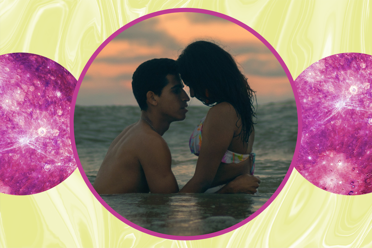 couple embracing in the ocean.