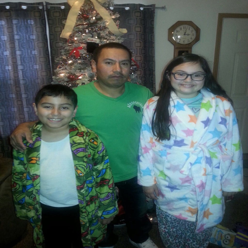 My brother, father, and I at Christmas Time