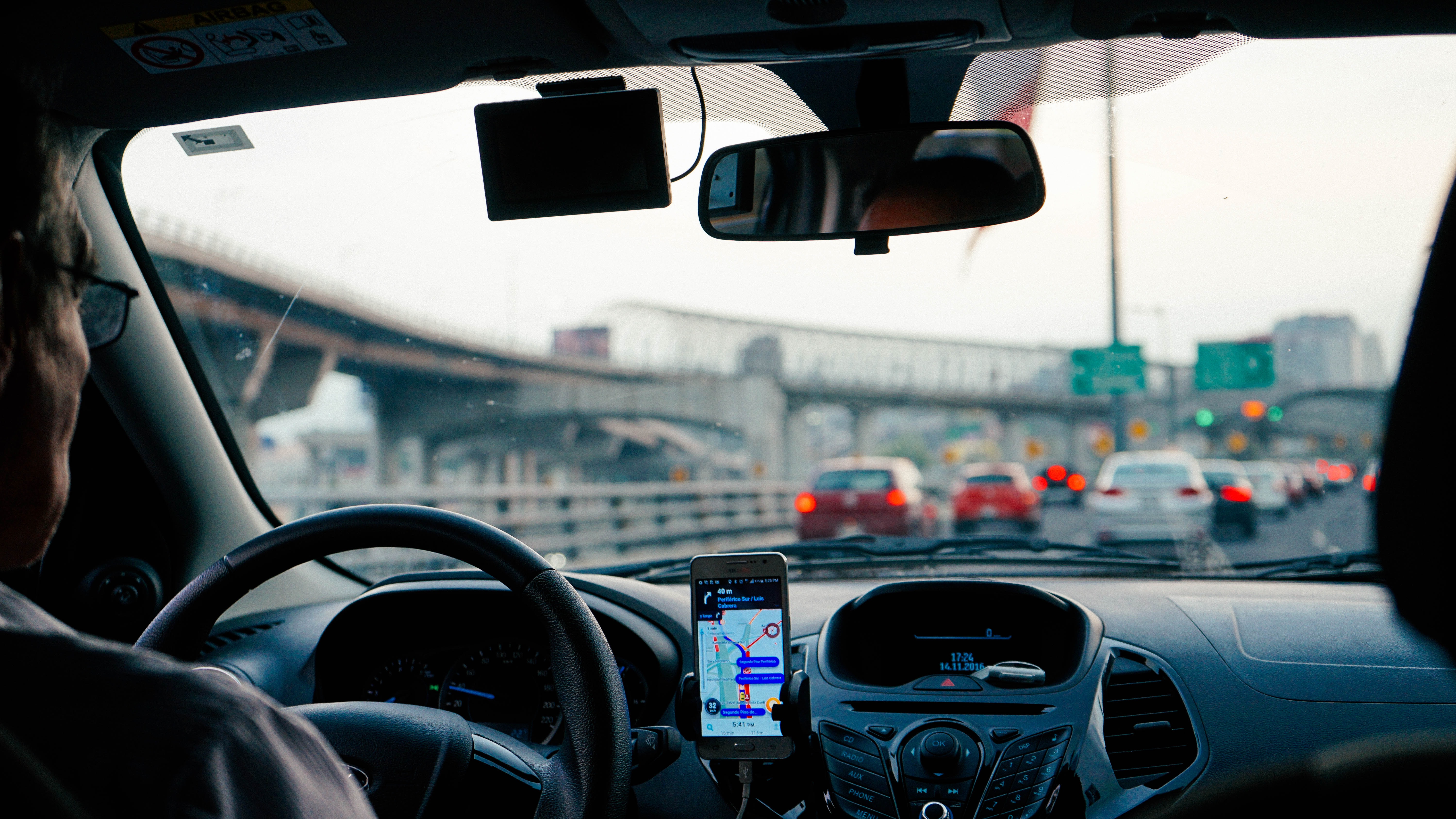 Man driving for Uber by Dan Gold via Unsplash