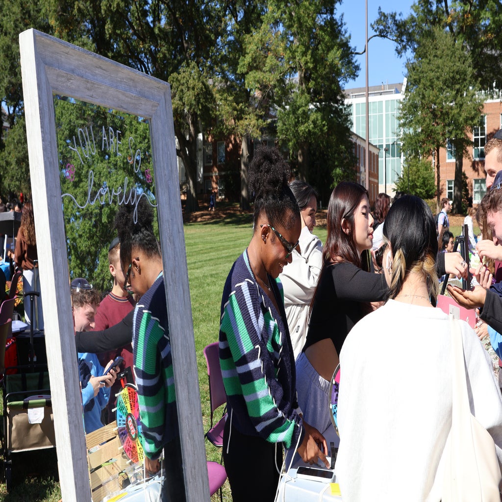 The Petal Project talks to students at their booth at the Self-Care Fair on McKeldin