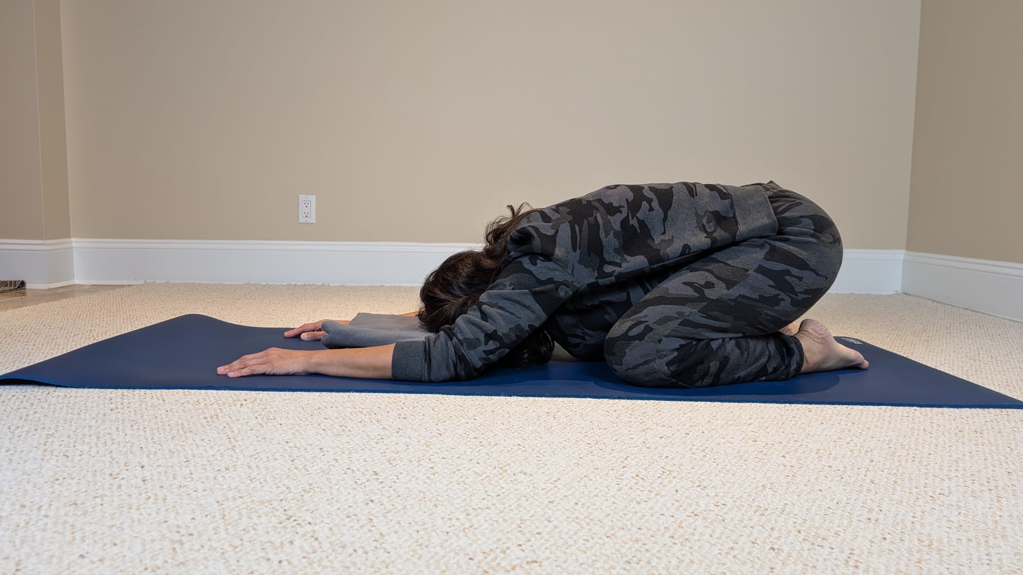 Woman in child\'s pose