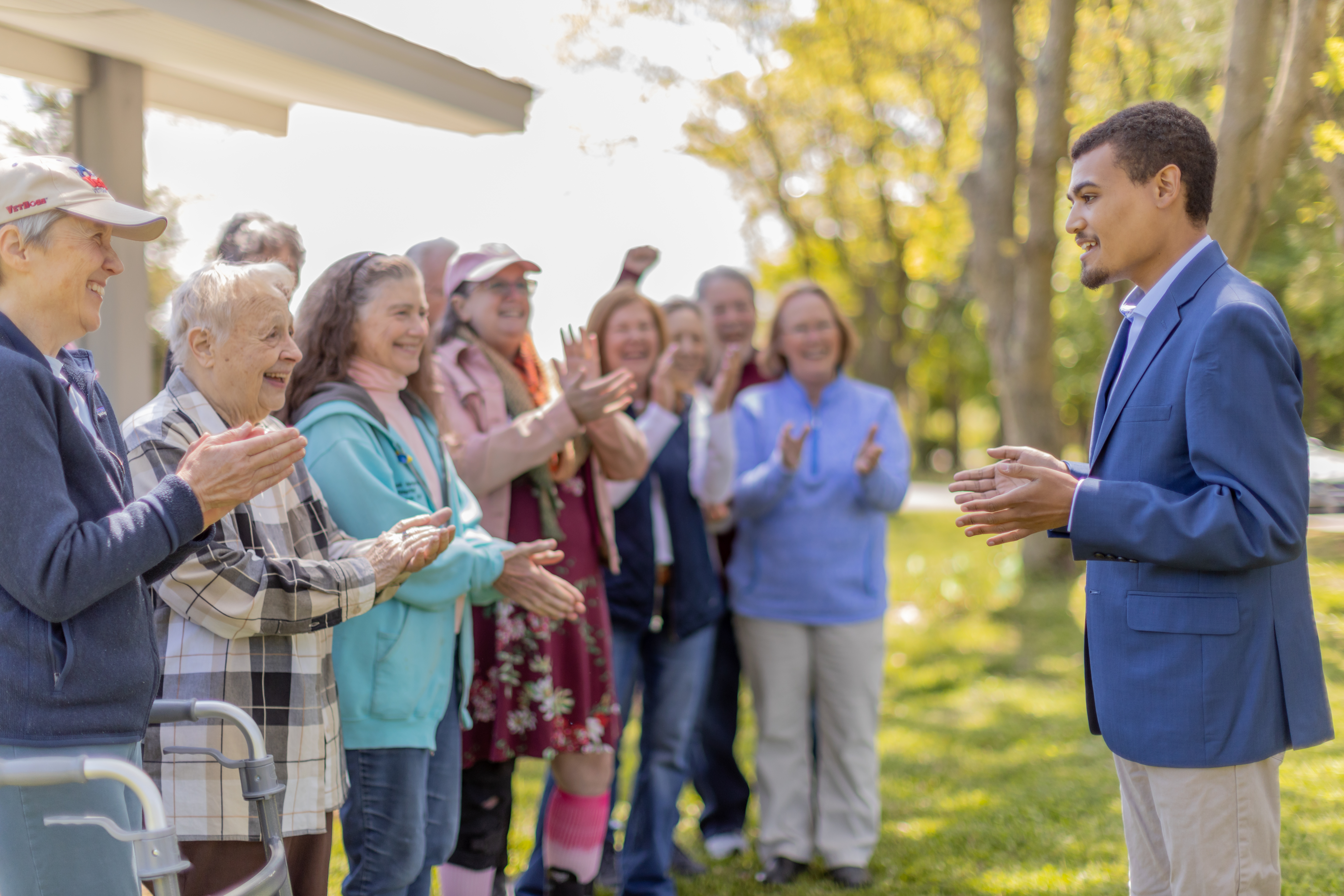 Skyler with clapping crowd