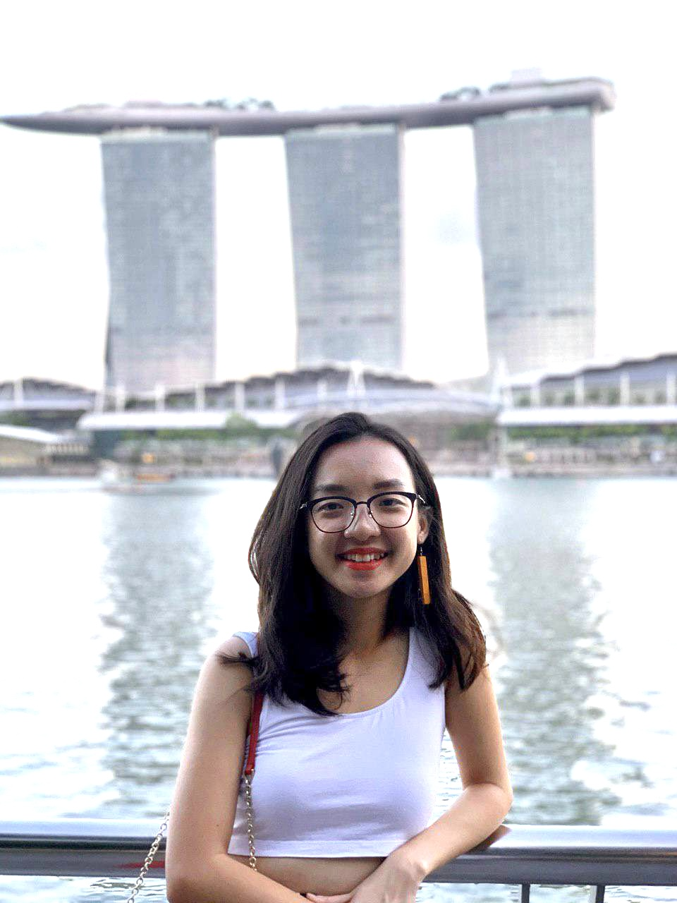 woman against Marina Bay Sands as background