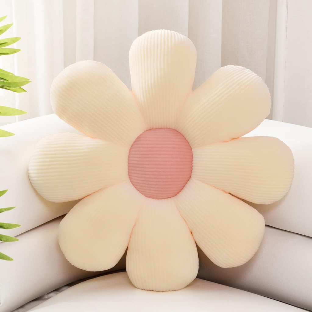 cream and pink flower-shaped throw pillow