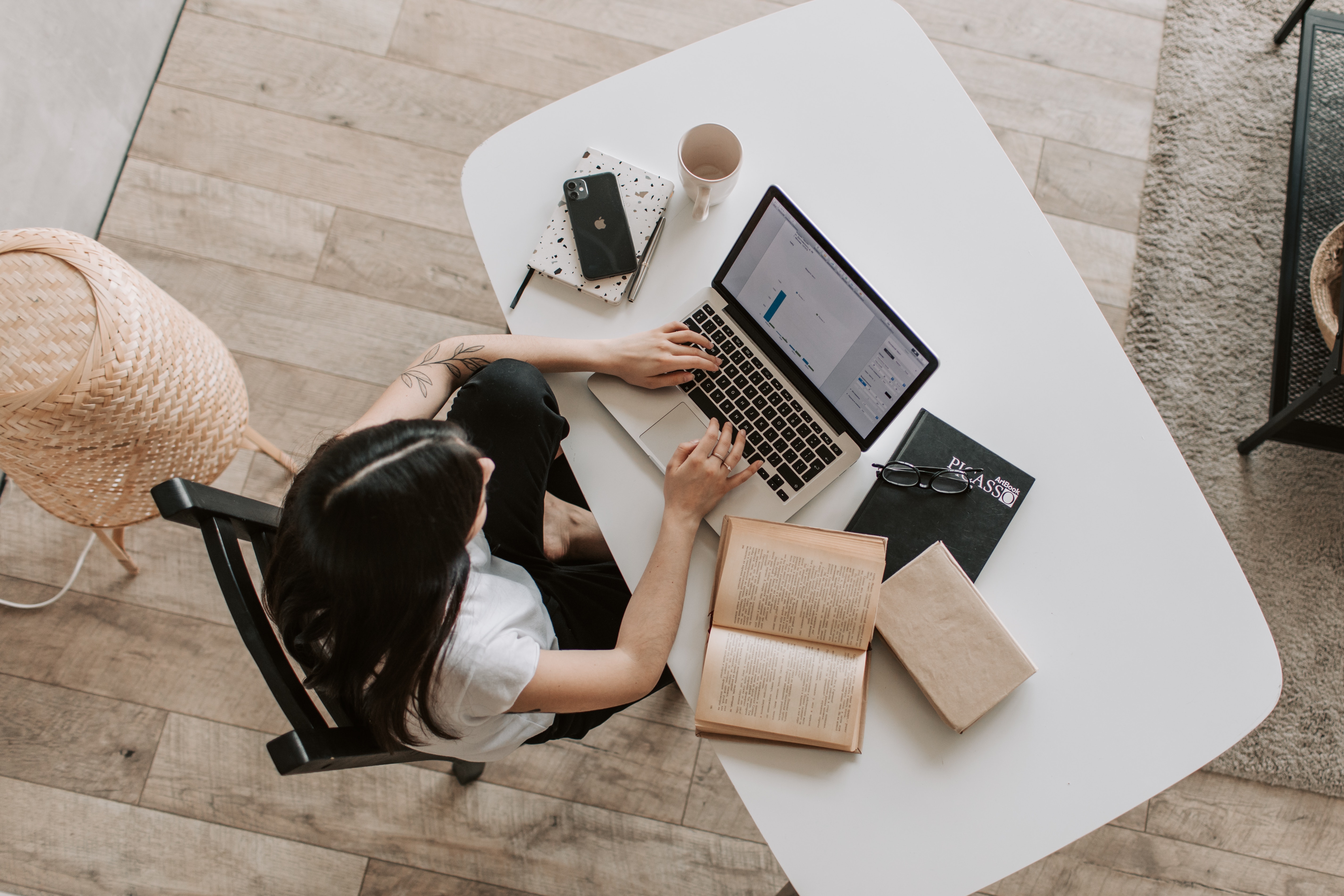 Woman focusing on studying on desk