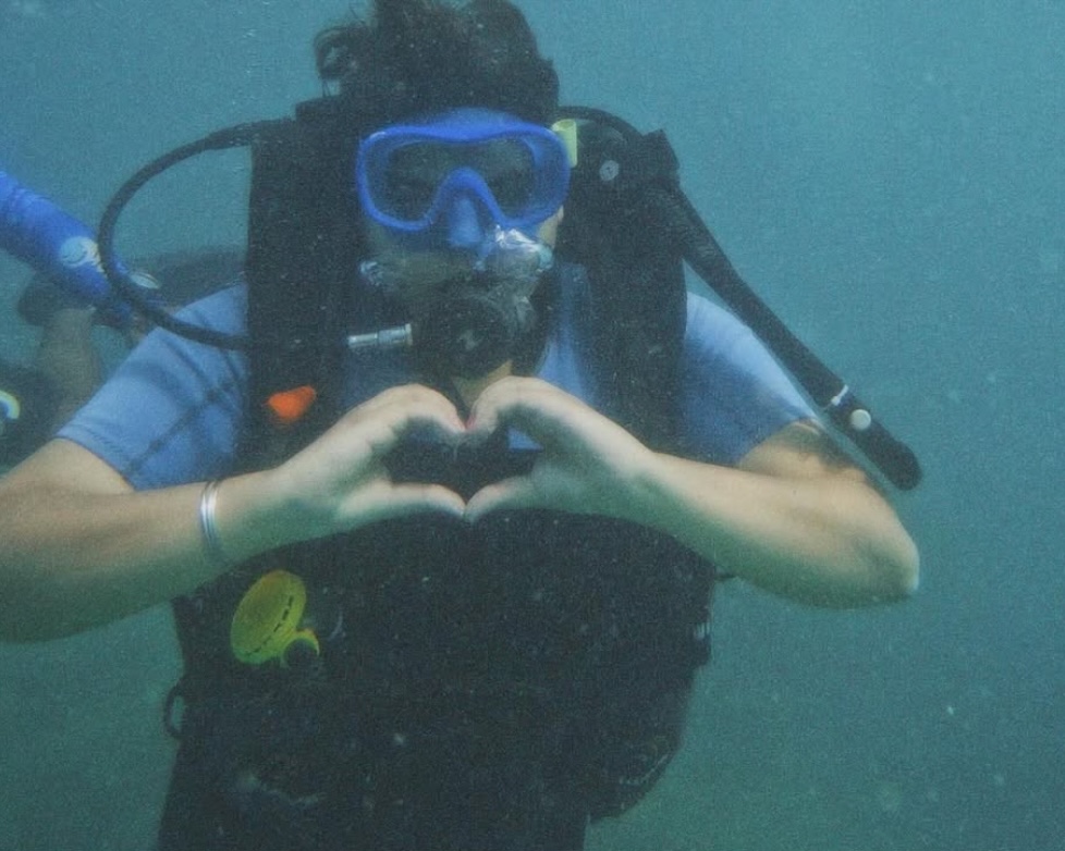 a girl (me) scuba diving in port blair, havelock island.
